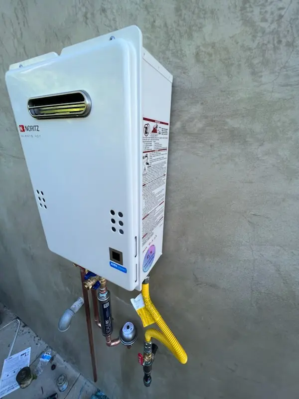Tankless water heater installation for Brick Store homes
